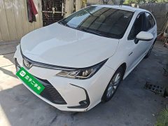 Toyota Corolla Hybrid 1.8L E-CVT Elite - ფოტო 1