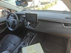 Toyota Corolla Hybrid 1.8L E-CVT Elite - ფოტო 9