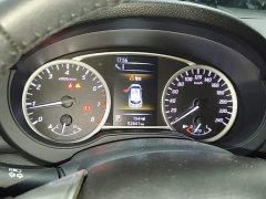 Nissan Qida Tiida 1.6L CVT Smart Edition - ფოტო 11