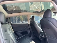 Tesla Model Y Rear-Wheel Drive - ფოტო 18