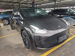 Tesla Model Y Rear-Wheel Drive - ფოტო 3