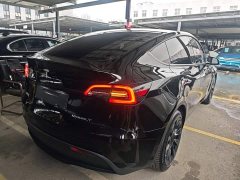 Tesla Model Y Rear-Wheel Drive - ფოტო 6
