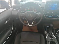 Toyota Corolla Hybrid 1.8L E-CVT Elite - ფოტო 10