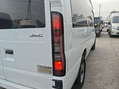 JMC 2.0T 6MT Diesel Mid-Axle Mid-High Roof Commercial Multi-Purpose 7-Seater - ფოტო 7