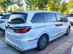 Honda Odyssey 2.0L e:HEV Luxury - фото 9