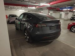 Tesla Model Y Rear-Wheel Drive - ფოტო 4