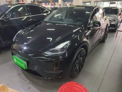 Tesla Model Y Standard Range RWD - фото 1