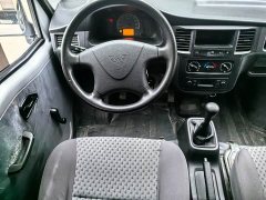 Wuling Zhiguang 1.5L Practical 5/7-seater - ფოტო 14