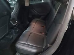 Tesla Model Y Rear-Wheel Drive - ფოტო 16