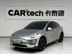 Tesla Model Y Rear-Wheel Drive - ფოტო 1