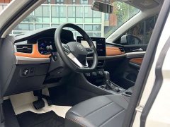 Volkswagen Bora 200TSI DSG Comfort Edition - ფოტო 4