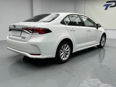 Toyota Corolla Hybrid 1.8L E-CVT Elite - ფოტო 18