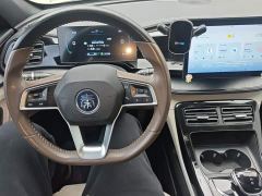 BYD Qin PLUS Champion Edition DM-i 55KM Leading - фото 9