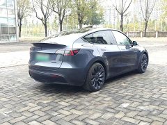 Tesla Model Y Performance All-Wheel Drive - ფოტო 4