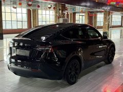 Tesla Model Y Standard Range RWD - фото 4