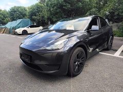 Tesla Model Y Rear-Wheel Drive - ფოტო 1
