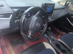 Toyota Corolla Hybrid 1.8L E-CVT Elite - ფოტო 12