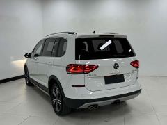 Volkswagen Touran L 280TSI DSG Boundary-Crossing Luxury Edition 6-seater - фото 6