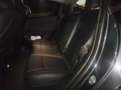 Tesla Model Y Rear-Wheel Drive - ფოტო 18
