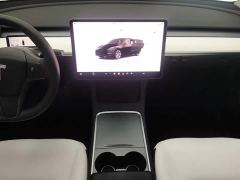 Tesla Model Y Rear-Wheel Drive - ფოტო 16