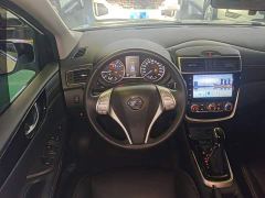 Nissan Qida Tiida 1.6L CVT Smart Edition - ფოტო 10