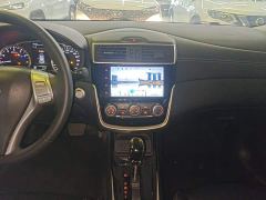Nissan Qida Tiida 1.6L CVT Smart Edition - ფოტო 12