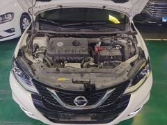 Nissan Qida Tiida 1.6L CVT Smart Edition - ფოტო 19