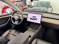 Tesla Model Y Rear-Wheel Drive - ფოტო 8