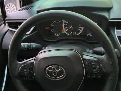 Toyota Corolla Hybrid 1.8H E-CVT Luxury - фото 17