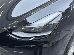 Tesla Model Y Standard Range RWD - ფოტო 11
