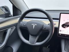 Tesla Model Y Standard Range RWD - ფოტო 17