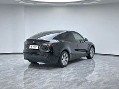 Tesla Model Y Standard Range RWD - ფოტო 3