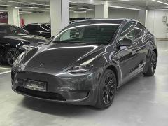 Tesla Model Y Rear-Wheel Drive - ფოტო 1