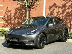 Tesla Model Y Rear-Wheel Drive - ფოტო 1