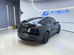 Tesla Model Y Long Range All-Wheel Drive - ფოტო 4