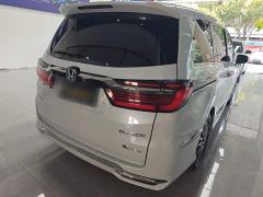Honda Odyssey 2.0L e:HEV Luxury - фото 6