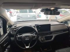 Honda Odyssey 2.0L e:HEV Luxury - фото 9