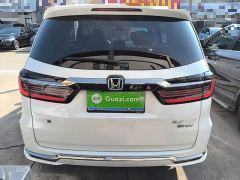 Honda Odyssey 2.0L e:HEV Luxury - ფოტო 5