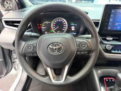 Toyota Corolla Hybrid 1.8H E-CVT Sport - ფოტო 15