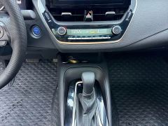 Toyota Corolla Hybrid 1.8H E-CVT Luxury - ფოტო 12