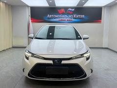 Toyota Corolla Hybrid 1.8H E-CVT Luxury - ფოტო 2