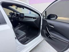 Toyota Corolla Hybrid 1.8H E-CVT Luxury - ფოტო 20