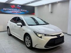 Toyota Corolla Hybrid 1.8H E-CVT Luxury - ფოტო 3