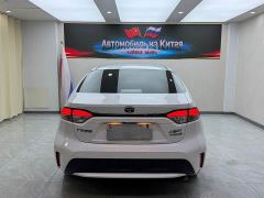 Toyota Corolla Hybrid 1.8H E-CVT Luxury - ფოტო 5