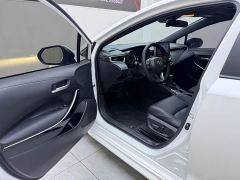 Toyota Corolla Hybrid 1.8H E-CVT Luxury - ფოტო 7