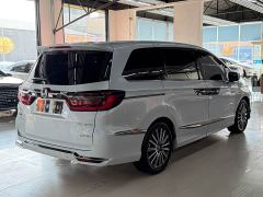 Honda Odyssey 2.0L e:HEV Luxury - ფოტო 4
