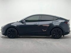 Tesla Model Y Rear-Wheel Drive - ფოტო 2