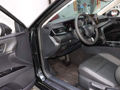 Toyota Camry Hybrid 2.0HE Elite - ფოტო 9