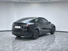 Tesla Model Y Rear-Wheel Drive - ფოტო 4