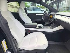 Tesla Model Y Performance All-Wheel Drive - ფოტო 11